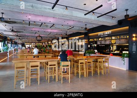 MIAMI BEACH, FL -15 FEB 2023- View of theTime Out Market Miami, an upscale curated gourmet food court located in Miami Beach, Florida. Stock Photo