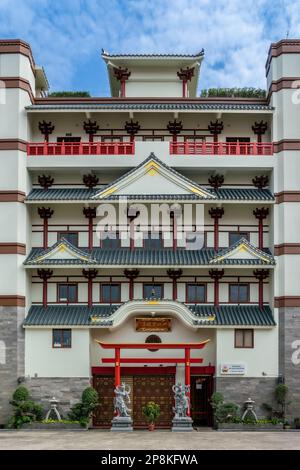 Main facade of True Buddha Shi Cheng Association Temple in Geylang, Singapore. Vertical Shot. Stock Photo