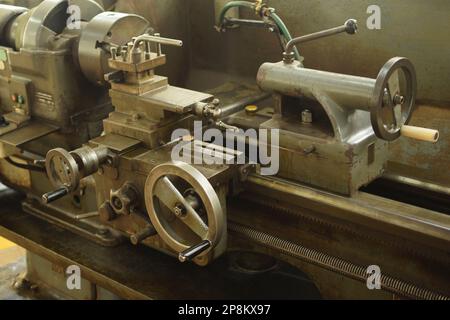 Metal lathe machine used primarily for shaping metal or wood, India Stock Photo