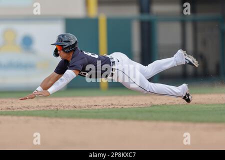 Lakeland FL USA; Detroit Tigers shortstop Gage Workman (27) steals second base during an MLB spring training game against the Washington Nationals at Stock Photo