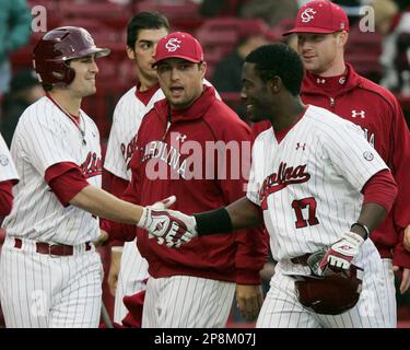 South Carolina's Whit Merrifield, left, shakes hands with DeAngelo