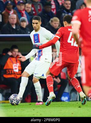 Achraf Hakimi, PSG 2  compete for the ball, tackling, duel, header, zweikampf, action, fight against Jamal MUSIALA, FCB 42  in the eighth finals match   FC BAYERN MUENCHEN -  PARIS SG 2-0 of football UEFA Champions League, match  in season 2022/2023 in Paris, Mar 08, 2023.  Achtelfinale, FCB, Munich, PSG © Peter Schatz / Alamy Live News Stock Photo