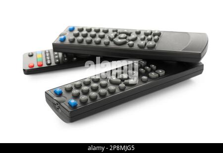 Different modern remote controls on white background Stock Photo