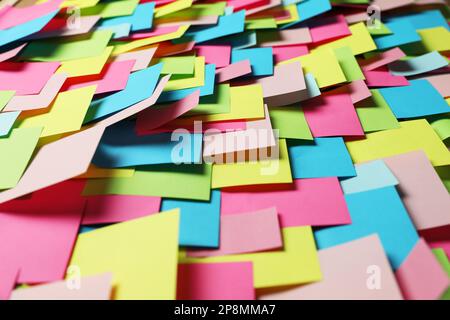 Colorful paper notes as background, closeup view Stock Photo