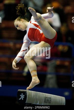 Switzerland's Yasmin Zimmermann performs on the balance beam during the ...