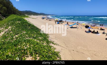 Cape Vidal, South Africa - 14 January 2023: people on the beach of Cape Vidal in Isimangaliso park, South Africa Stock Photo