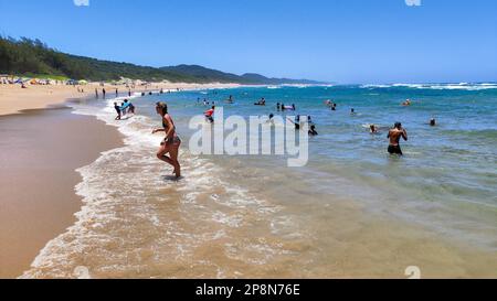 Cape Vidal, South Africa - 14 January 2023: people on the beach of Cape Vidal in Isimangaliso park, South Africa Stock Photo