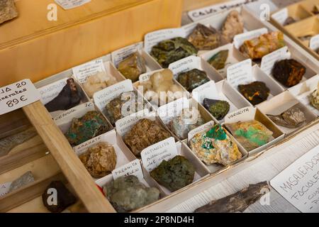 Variety of mineral speciments on counter in souvenir shop Stock Photo