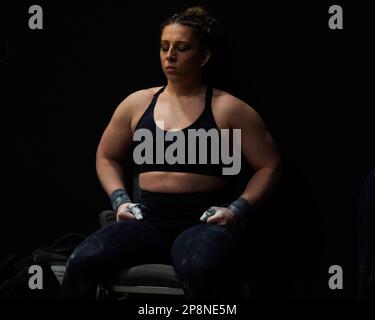 Columbus, Ohio, United States. 3th Mar, 2023.  Shelby Pflug rests in between the snatch and the clean and jerk at the Rogue Stage in Columbus, Ohio, USA. Credit: Brent Clark/Alamy Live News Stock Photo