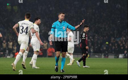 London, UK. 08th Mar, 2023. French Referee Clement Turpin looks on after being struck by the ball by Sandro Tonali. UEFA Champions league round of 16, 2nd leg match, Tottenham Hotspur v Milan at the Tottenham Hotspur Stadium in London on Wednesday 8th March 2023. this image may only be used for Editorial purposes. Editorial use only. pic by Sandra Mailer/Andrew Orchard sports photography/Alamy Live news Credit: Andrew Orchard sports photography/Alamy Live News Stock Photo
