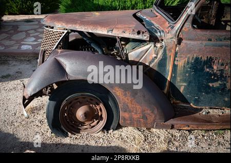 Old rusty metal car parking garages fence in barbed wire Stock Photo ...