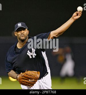 New York Yankees pitcher CC Sabathia delivers a warm-up pitch before the  Yankees spring training baseball game against the Detroit Tigers at  Steinbrenner Field in Tampa, FL. (AP Photo/Kathy Willens Stock Photo - Alamy