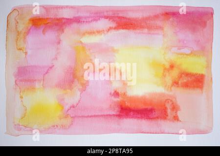 Blurred colored abstract background with pink and yellow watercolor paints. Stock Photo