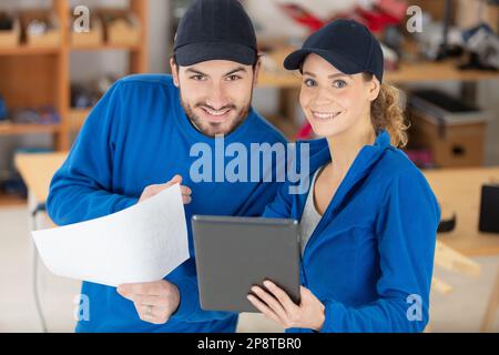 stylish female engineer and male specialist Stock Photo