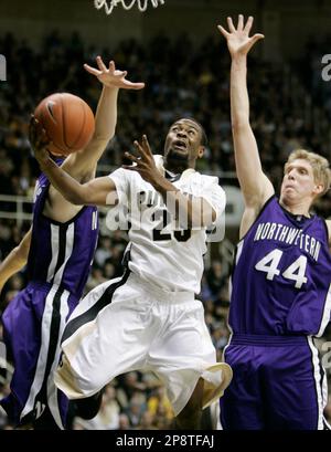 Purdue guard Ryne Smith (24) congratulates teammate Lewis Jackson, right,  during the second half against St. Peter's in the second round of the 2011  NCAA Men's Basketball Championship at the United Center