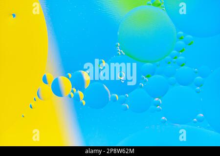 Bright abstract, multicolored background with oil circles Stock Photo