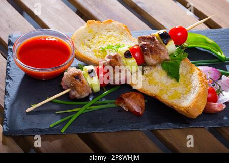 Shashlik (mutton slices on barbecue skewers) Stock Photo