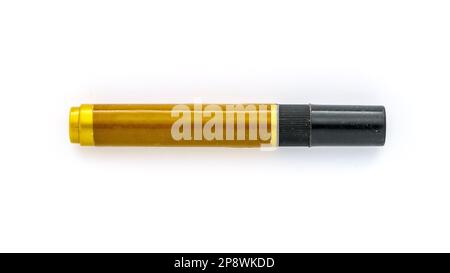 Big permanent marker with empty yellow label isolated on white background. Stock Photo