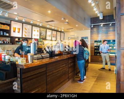 Missouri, FEB 23 2023 - Interior view of the Starbucks Coffee Stock Photo