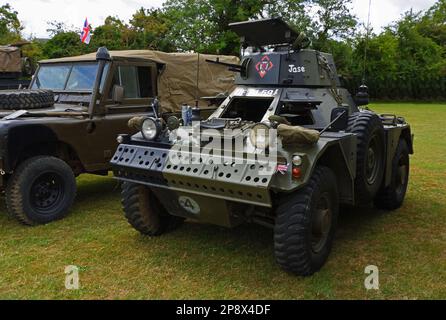 ST NEOTS, CAMBRIDGESHIRE, ENGLAND - JULY 02, 2022:  Vintage  armoured scout car parked on grass. Stock Photo