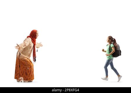 Muslim woman in ethnic clothes waiting to hug a schoolgirl isolated on white background Stock Photo