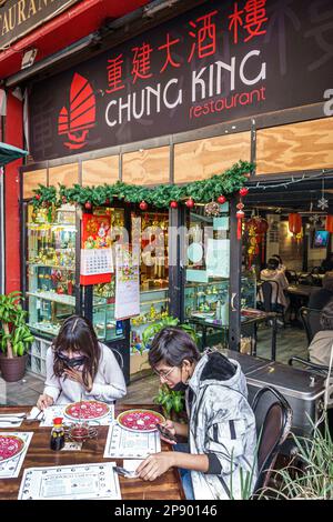 Mexico City,Barrio Chino Chinatown,Chung King,sitting table,man men male,woman women lady female,adult adults,resident residents,couple couples,outsid Stock Photo