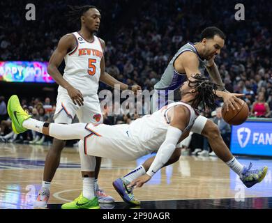 Sacramento, CA, USA. 9th Mar, 2023. Sacramento Kings forward Trey Lyles (41) knocks over New York Knicks guard Jalen Brunson (11) in the first quarter during a game at Golden 1 Center in Sacramento, Thursday, March 9, 2023. (Credit Image: © Paul Kitagaki Jr./ZUMA Press Wire) EDITORIAL USAGE ONLY! Not for Commercial USAGE! Stock Photo