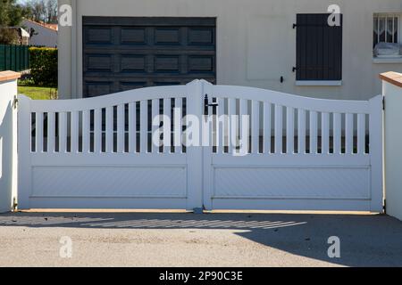 portal white design door pvc vinyl gate of modern house Stock Photo - Alamy