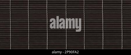 Black Asian bamboo mat texture. Banner background wallpaper Stock Photo