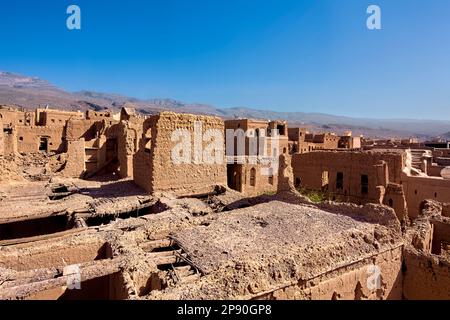 Falling down mud-brick ruins of the old village in Al Hamra, Oman Stock Photo