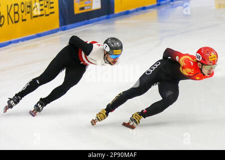 Seoul, South Korea. 10th Mar, 2023. Roberts Kruzbergs (L) of Latvia and Lin Xiaojun of China compete during the heats of men's 1000m at the ISU World Short Track Speed Skating Championships in Seoul, South Korea, March 10, 2023. Credit: Wang Yiliang/Xinhua/Alamy Live News Stock Photo