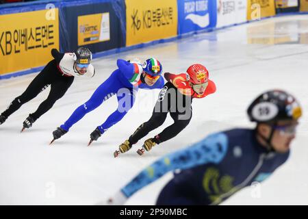 Seoul, South Korea. 10th Mar, 2023. Roberts Kruzbergs of Latvia, Pietro Sighel of Italy and Lin Xiaojun of China (L to R, rear) compete during the heats of men's 1000m at the ISU World Short Track Speed Skating Championships in Seoul, South Korea, March 10, 2023. Credit: Wang Yiliang/Xinhua/Alamy Live News Stock Photo