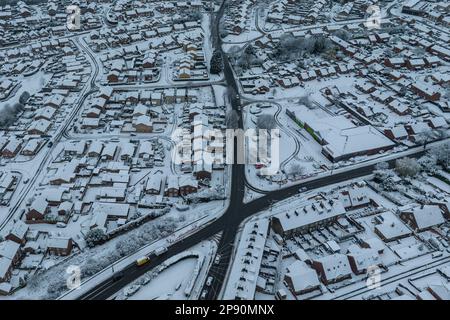 An aerial view of the village of Monk Bretton in Barnsley as Yellow warning of snow is enforce in the Yorkshire area; Monk Bretton, Barnsley,  South Yorkshire, United Kingdom, 10th March 2023  (Photo by Mark Cosgrove/News Images) Stock Photo