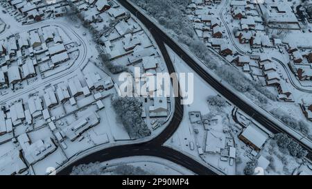 An aerial view of the village of Monk Bretton in Barnsley as Yellow warning of snow is enforce in the Yorkshire area; Monk Bretton, Barnsley,  South Yorkshire, United Kingdom, 10th March 2023  (Photo by Mark Cosgrove/News Images) Stock Photo