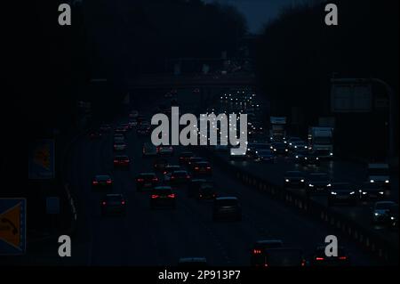A nocturnal view of traffic travelling along the M3 motorway between junctions 3 and 4 in Surrey Stock Photo
