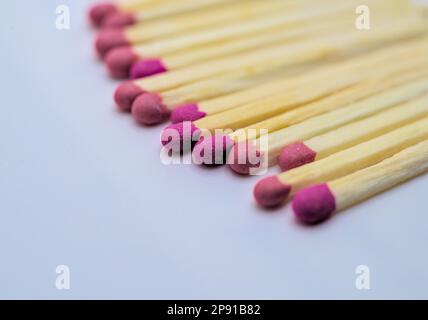 Photo of red matches on white background, selective focus Stock Photo