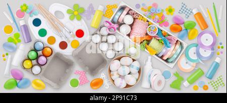 Table Top View of Easter Crafts and Materials for Colorful Egg Decoration and Ornament Making, Colors, Ribbons, tools and Embellishments, DIY Enthusia Stock Photo