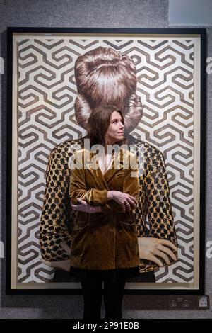 London, UK.  10 March 2023. A staff member views 'Celia', 2015, by Ángeles Agrela (Est. £15,000 - £20,000) at a preview for the Post-War & Contemporary Art sale at Bonhams.  Artworks will be offered for sale at Bonhams New Bond Street galleries on 16 March.  Credit: Stephen Chung / Alamy Live News Stock Photo