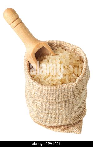 Uncooked white rice and wooden scoop in a rough burlap bag, isolated on white background Stock Photo