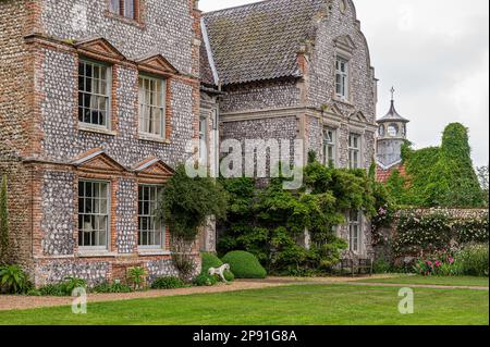 Brick and flint Dutch gabled 17th century Jacobean manor house Wiveton Hall in Norfolk, UK Stock Photo