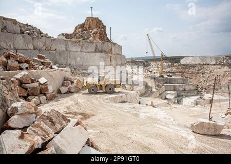 April 2, 2014, Afyonkarahisar, scehisar, Turkey: Large construction machines make it possible to transport blocks. The quarries at Iscehisar (ancient Dokimeion) in central Phrygia were a major source of white marble and a purple-streaked marble called pavonazzetto. The quarries were controlled by the Roman state but this does not mean that all of the marble quarried here was imperially controlled. White marble from these quarries was predominately used for sarcophagi and statuary locally, though these objects were sometimes exported. The pavonazzetto quarried at Iscehisar, however, was widely Stock Photo