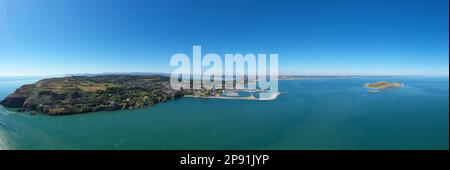 Howth, co. Dublin / Ireland - September 2020 : Aerial view of The Baily Lighthouse on Howth Head. Whole Howth peninsula visible in the frame. Stock Photo