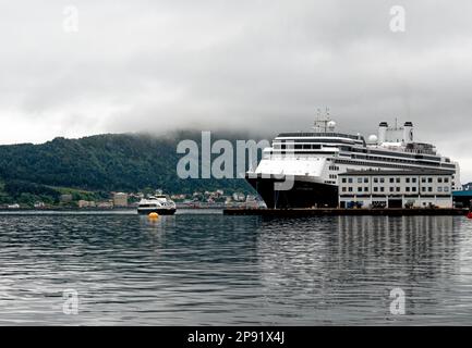 Holland America MV Rotterdam cruise ship in Alesund town and municipality in More og Romsdal county, Norway. Travel destination North of Europe. 19th Stock Photo