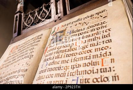 TURIN, ITALY - CIRCA MAY 2021: antique Medieval manuscript with ancient calligraphy Stock Photo