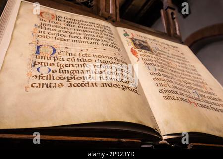 TURIN, ITALY - CIRCA MAY 2021: antique Medieval manuscript with ancient calligraphy Stock Photo