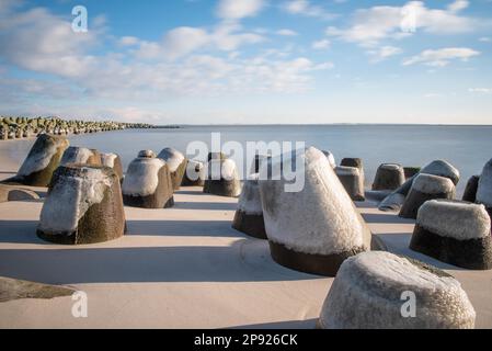 Long exposure at the tetrapods in front of Hoernum Stock Photo
