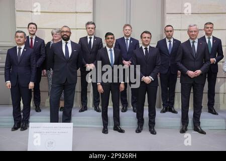 (Front row left-right) French Interior Minister Gerald Darmanin, Foreign Secretary James Cleverly, Prime Minister Rishi Sunak, President of France, Emmanuel Macron and French Economy and Finance Minister Bruno Le Maire during a group picture at the first UK-France summit in five years at Elysee Palace in Paris. Picture date: Friday March 10, 2023. Stock Photo