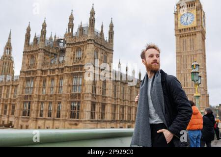Male traveler near London's Big Ben Stock Photo