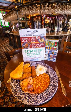 England, Kent, Folkestone, Wetherspoon Pub, The Samuel Peto, A Converted Chapel, Breakfast Meal and Food Menu Stock Photo