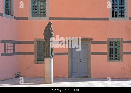 Statue of Benedictine nun at the Benedictine convent and Church of St. Mary of the Angels in the Old Town of Krk, Primorje-Gorski Kotar, Croatia Stock Photo